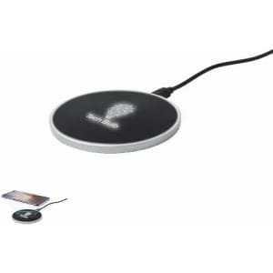 A wireless charging pad in black with a silver edge, featuring a subtle logo on the surface.