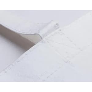 A close-up of a white fabric with stitching details, featuring a smooth surface and a subtle texture.
