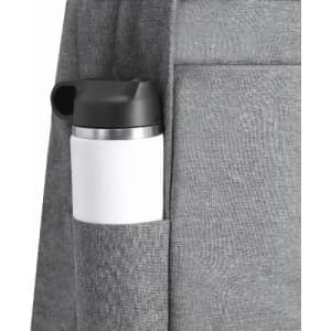 A grey backpack featuring a side pocket holding a white and black drink bottle.