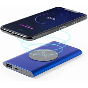 A wireless charger in blue with a smartphone positioned above it, displaying a charging indicator on the screen.