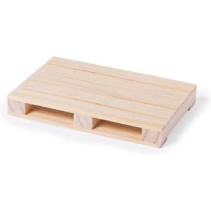 A wooden pallet featuring a natural wood finish with slats and two cutout spaces for handling.
