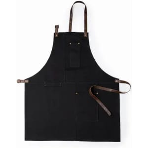 A black apron featuring multiple pockets and brown leather straps. It has a simple, functional design.
