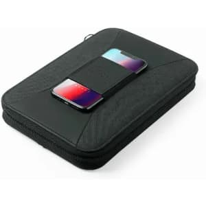 A sleek black laptop sleeve with a mobile phone secured on top, featuring a wireless charging pad.