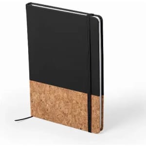 A notebook with a black cover and a cork bottom, featuring an elastic band and a ribbon bookmark.