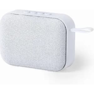 A portable speaker in white fabric with control buttons on top and a loop for attachment.