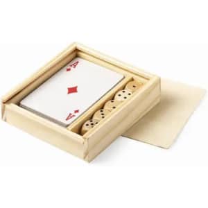 A wooden box containing a deck of playing cards and several dice, featuring a red diamond design on the card.