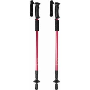 A pair of red hiking poles with black grips and straps, featuring adjustable length and rubber tips.
