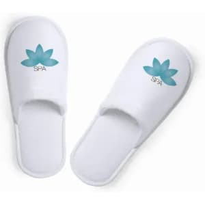 White spa slippers featuring a teal lotus flower design and soft fabric for comfort.