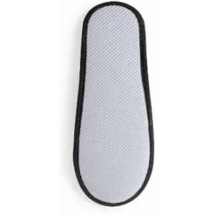 A shoe insole with a textured white surface and a black border.