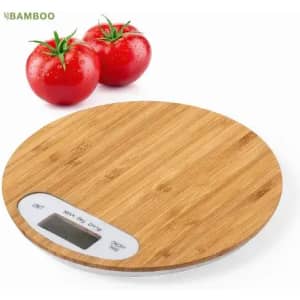 A round bamboo kitchen scale with a digital display, accompanied by two fresh red tomatoes.