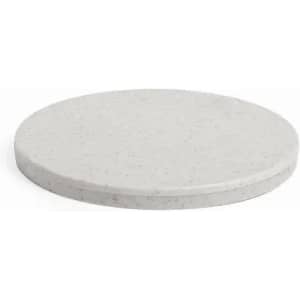 A circular marble serving board in a light grey colour with a smooth surface and a thick edge.