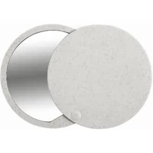 A circular mirror with a textured, light grey casing, featuring a sleek design and a small dot detail.