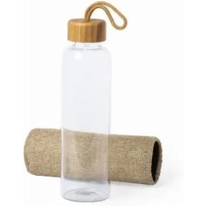 A drink bottle with a clear body, bamboo lid, and a rope handle, resting on a natural jute sleeve.