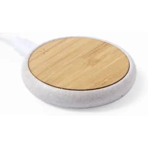 A round wireless charger with a bamboo top and a textured grey base, featuring a simple cord connection.