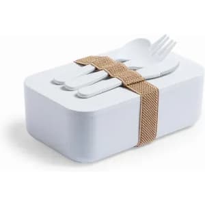 A white lunchbox with a brown elastic strap holding a fork, knife, and spoon on top.