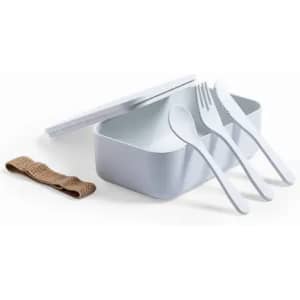 A white lunchbox with a lid, accompanied by beige utensils and a brown elastic band.