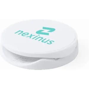 A white compact with a logo on top, featuring a sliding mechanism for opening and closing.
