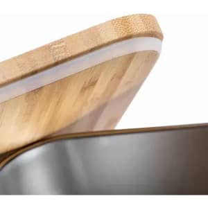 A product featuring a bamboo lid and a metallic base, showcasing a clean and modern design.