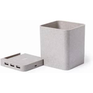 A grey charging station with a square container design and multiple USB ports. It includes a removable lid.