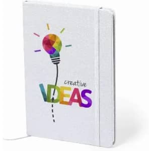 A white notebook featuring a colourful light bulb design, with the words "creative IDEAS" in vibrant colours.
