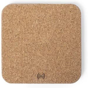 A cork charging pad in a square shape with rounded corners and a small logo on the surface.