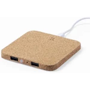 A charging pad in a natural cork finish with two USB ports and a white charging cable.