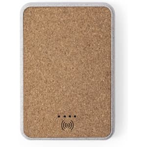 A wireless charger featuring a cork surface with a white border and a logo.