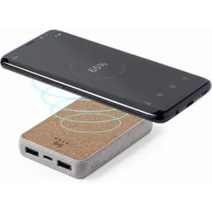 A wireless phone charger with a textured grey base and a sleek black smartphone hovering above it, indicating charging status.
