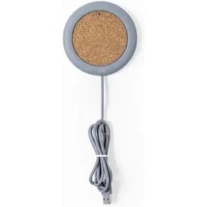 A round wireless charger with a cork surface and a grey rim, featuring a grey USB cable attached.
