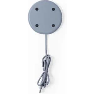 A grey circular magnetic base with four holes and a connected cable. It has a simple, minimalist design.