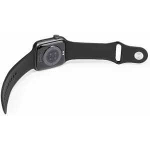 A black smartwatch with a black silicone strap and a round display, featuring a logo on the back.
