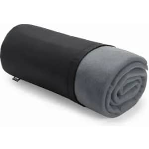 A rolled blanket with a black exterior and soft grey interior, secured neatly for storage.