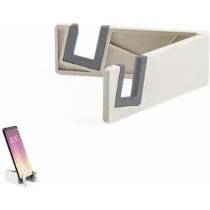 A phone stand in a light cream colour with grey accents, designed to hold smartphones at an angle.