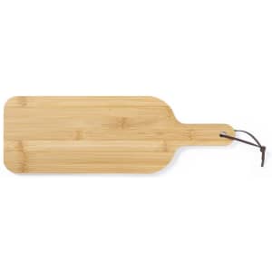 A bamboo serving board in a rectangular shape with a handle and a leather loop for hanging.