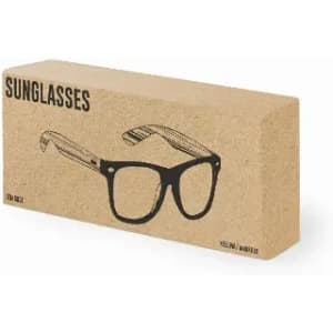 A box containing sunglasses with a black frame and illustrated wooden arms. The box has a minimalist design.