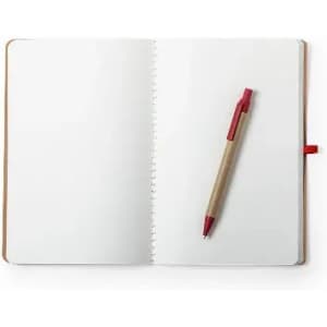 A blank notebook with a spiral binding and a red pen placed on the right side. The cover is brown.