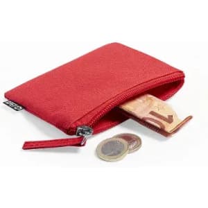 A red zippered pouch containing coins and a folded banknote. The pouch has a small logo.