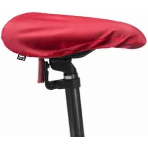 A bike seat covered with a bright red protective cover, attached to a black seat post. The image features a logo.