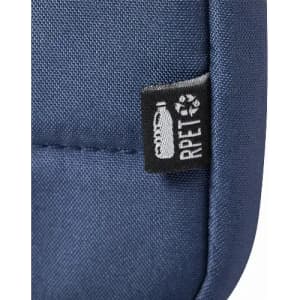 A navy blue fabric with a small black tag featuring a logo and recycling symbol.