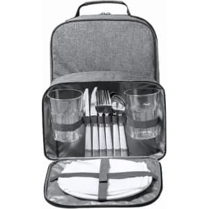 A portable picnic backpack featuring grey fabric, with cutlery, glasses, plates, and napkins neatly organised inside.