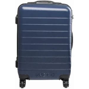 A suitcase in navy blue with a textured surface and four wheels for mobility. It features a handle and a logo.