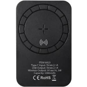 A wireless charger in black with a circular charging area and various input/output specifications on the back.