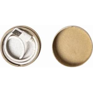A circular container with a beige interior, housing a white USB cable. The lid is off, revealing its contents.