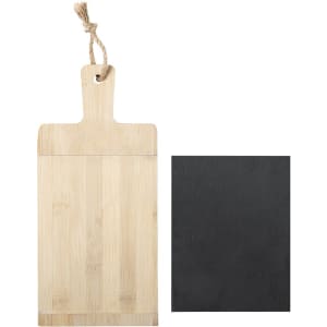 A bamboo cutting board with a handle and a black slate serving board, both featuring natural textures.
