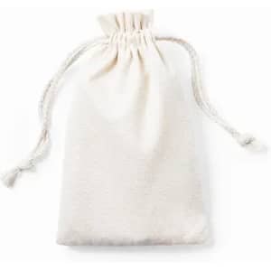 A drawstring pouch in cream colour, with a textured surface and two fabric ties on top. Contains no visible items.