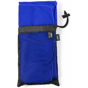 A blue towel neatly folded inside a black mesh carrying pouch with a drawstring closure.