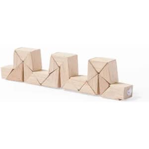 A set of wooden building blocks in natural colour arranged in a wave pattern, featuring various geometric shapes.