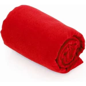 A rolled-up red blanket made of soft material, featuring a smooth texture.