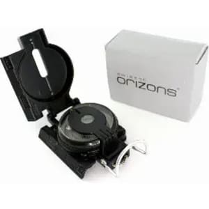 A black compass in a folded position, with a grey box visible in the background. The compass includes a branding logo.