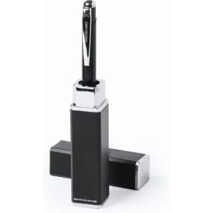 A black and silver promotional product with a sleek design and a pen on top, featuring a logo.